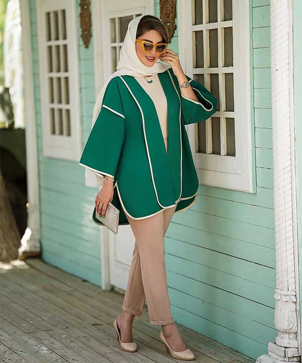 Pairing a green coat with pants